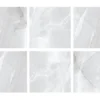 Πορσελανάτα πλακάκια δαπέδου Τεχνογρανίτη Thunder Blanco 60 x 60 cm.